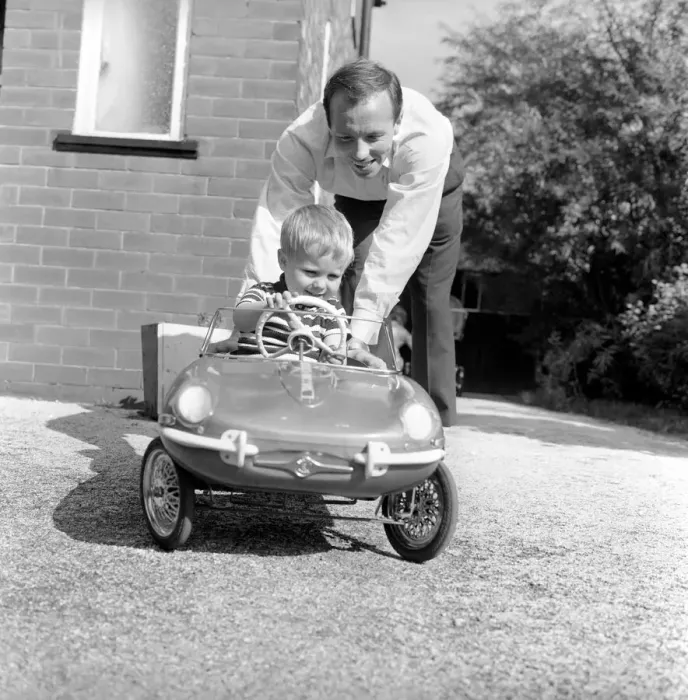 Framed Print : England Footballer Nobby Stiles seen here relaxing with his family
