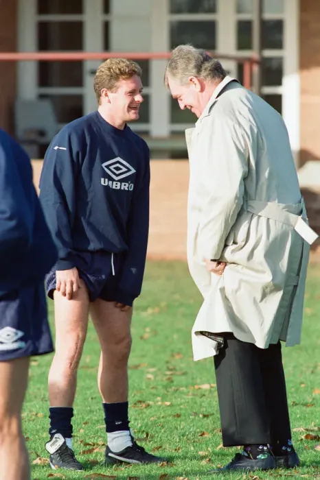Framed Print : England footballer Paul Gascoigne joking around with coach Lawrie McMenemy at their Framed Print : England footballer Paul Gascoigne joking around with coach Lawrie McMenemy at their