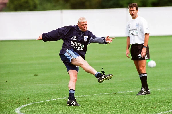 England footballer Paul Gascoigne practices his shooting during a training session at