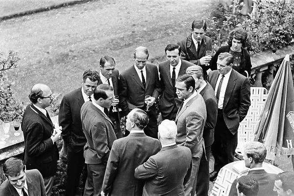 England footballers and manager Alf Ramsey meeting actor Sean Connery during the visit
