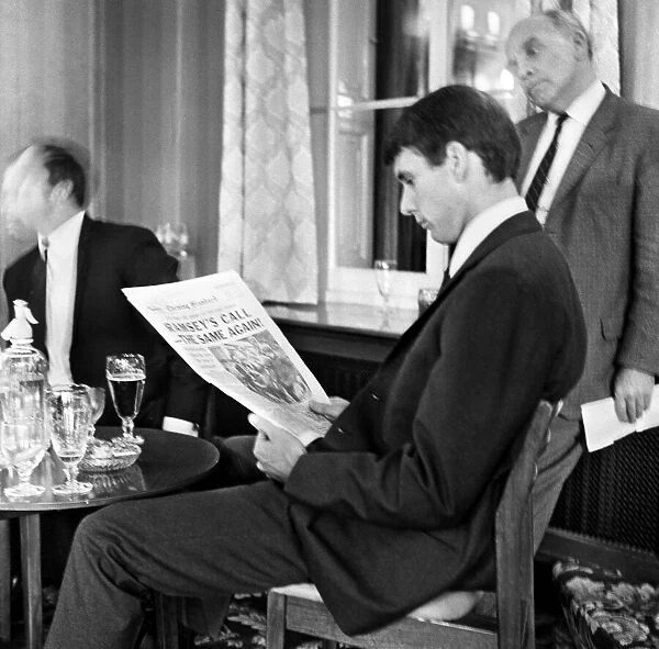 England hat-trick hero Geoff Hurst reading the papers the day after his side