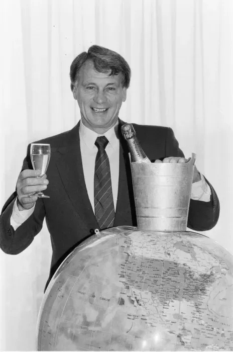 Framed Print : England manager Bobby Robson holds a glass of champagne in one hand looks forward to Framed Print : England manager Bobby Robson holds a glass of champagne in one hand looks forward to