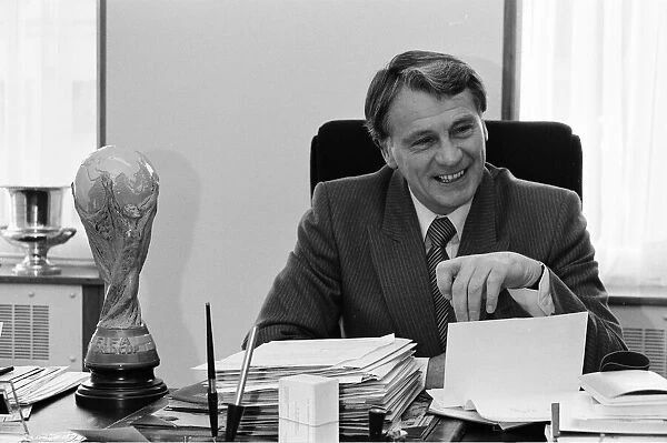 England manager Bobby Robson sitting at his busy desk as he gets prepared for his