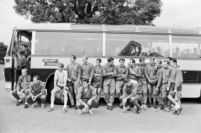 Framed Print : The England squad stand next to their coach as they relax at Hendon Hall Hotel the day Framed Print : The England squad stand next to their coach as they relax at Hendon Hall Hotel the day