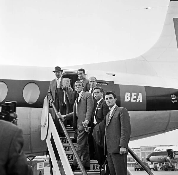 England team board their plane at Heathrow as they take a flight to Belfast for their
