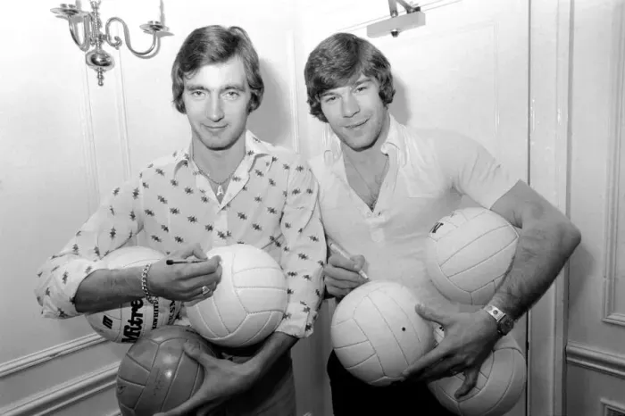 Framed Print : England team at hotel: Alan Hudson left and Malcolm MacDonald sign match footballs Framed Print : England team at hotel: Alan Hudson left and Malcolm MacDonald sign match footballs