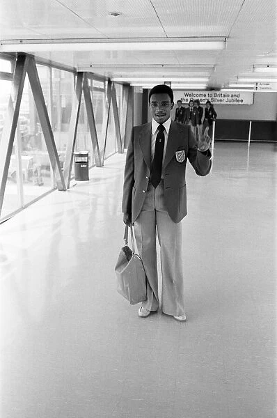 England U21 Laurie Cunningham leaving Heathrow Airport for Helsinki. 24th May 1977