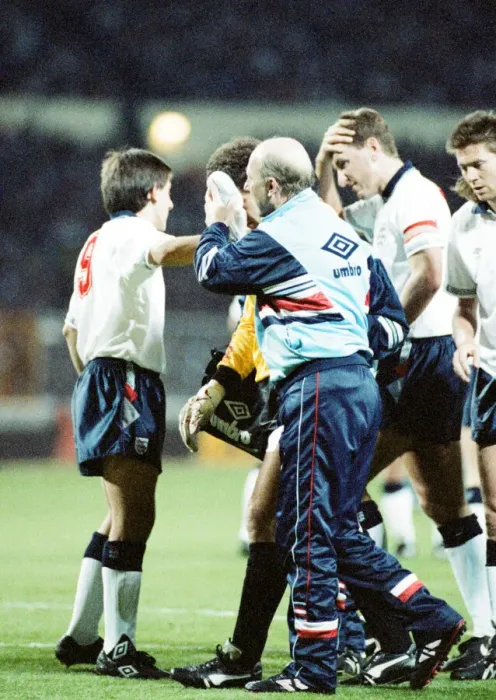 Framed Print : England v Brazil 28th March 1990, Wembley. Peter Shilton is led from the field by physio Framed Print : England v Brazil 28th March 1990, Wembley. Peter Shilton is led from the field by physio
