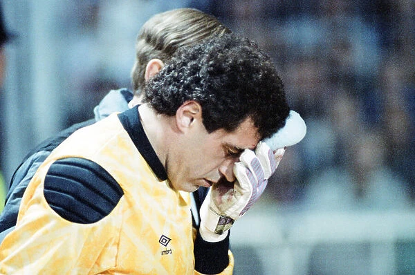 England v Brazil 28th March 1990, Wembley. Peter Shilton leaves the pitch with a head