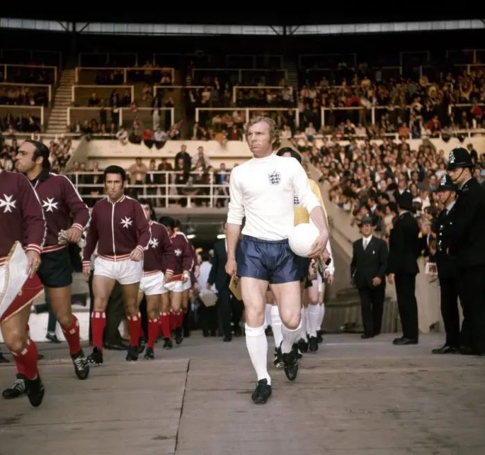 Framed Print : England v Malta, Wembley Stadium, 10. 05. 71. England captain Bobby Moore leads Framed Print : England v Malta, Wembley Stadium, 10. 05. 71. England captain Bobby Moore leads