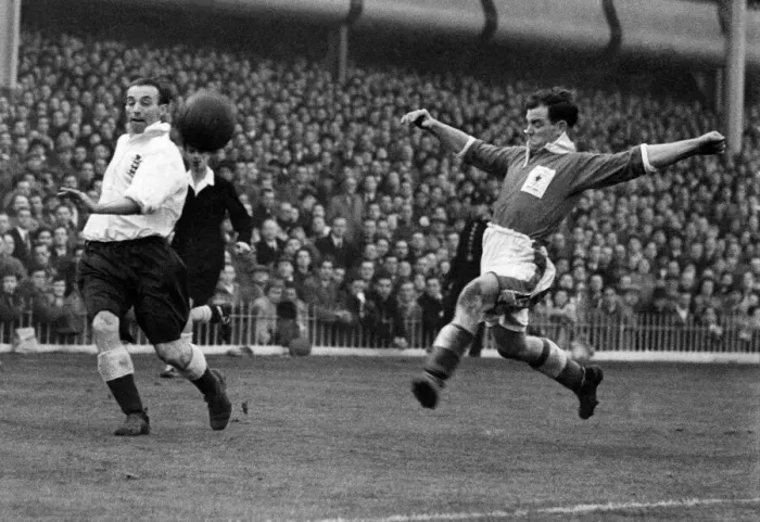 Framed Print : England v. Wales at Villa Park. Matthews, left, trying to intercept a shot by Sherwood Framed Print : England v. Wales at Villa Park. Matthews, left, trying to intercept a shot by Sherwood