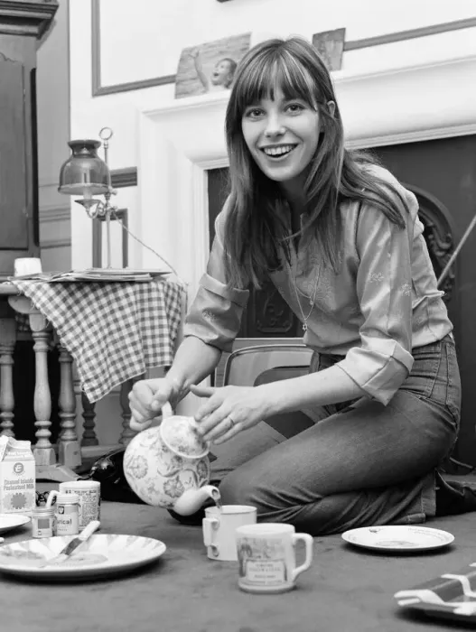 Framed Print : English actress and singer Jane Birkin pictured at home pouring tea. March 1971