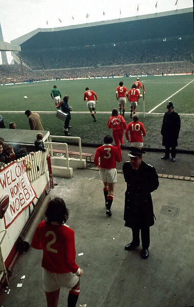 English FA Cup match at Old Trafford The United team walk onto the pitch at Old
