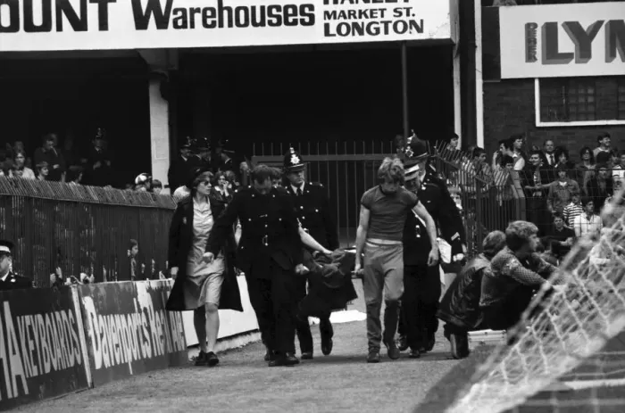 Framed Print : English League Division One match. Stoke City 2 v Arsenal 1 Fan stretchered Framed Print : English League Division One match. Stoke City 2 v Arsenal 1 Fan stretchered