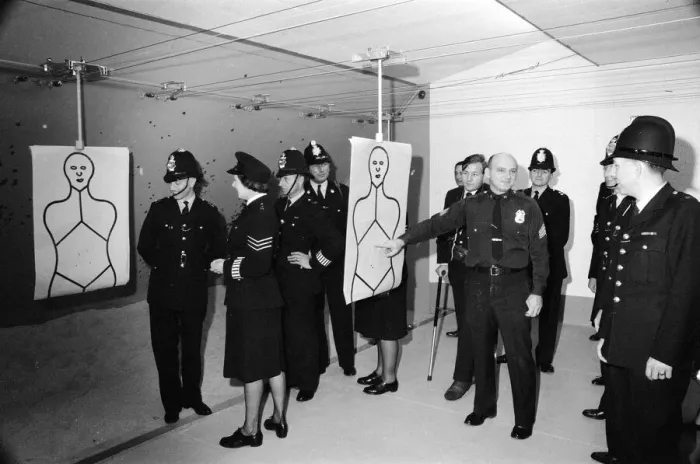 Framed Print : English police officers tour a firing range at a New York Police Department in America Framed Print : English police officers tour a firing range at a New York Police Department in America