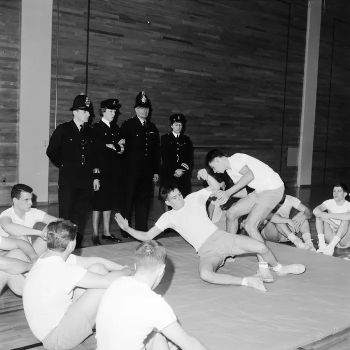 Framed Print : English police officers watch & take part in a hand to hand fighting training session Framed Print : English police officers watch & take part in a hand to hand fighting training session