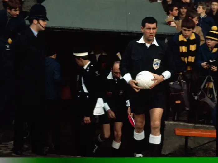 Framed Print : English referee Jack Taylor enters the pitch before taking charge of n English league