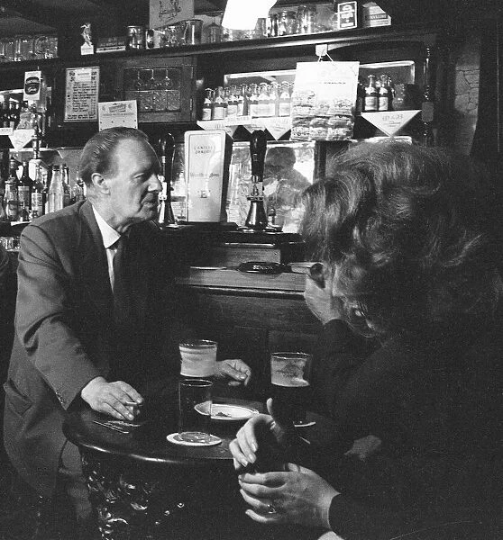Enjoying a pint and a cigarette at The Olde Leathern Bottel, Wednesbury. 28th July 1963