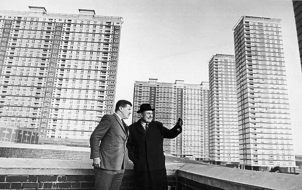 Enoch Powell looks at the Red Road Flats in Glasgow with the prospective candidate for