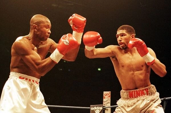 Ensley Bingham covers up against Ronald Wright of the USA in their WBO Light Middleweight
