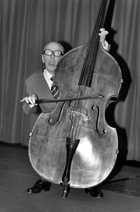 Framed Print : Entertainment. Music. Arthur A. Askey playing the cello. February 1981 81-00677 Framed Print : Entertainment. Music. Arthur A. Askey playing the cello. February 1981 81-00677