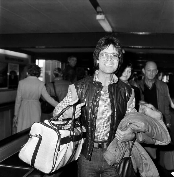 Entertainment. Music: Departure of pop singer Cliff Richard flying to Los Angeles to make