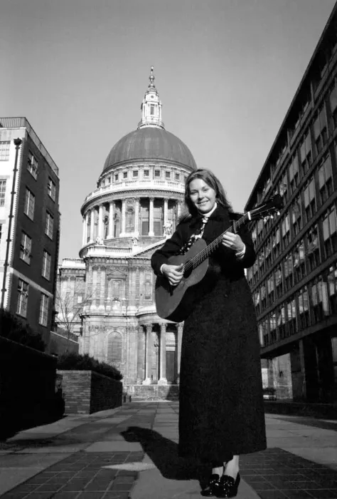 Framed Print : Entertainment: Music. Folk singer Suzanne Harris sang to a lunch time audience in St