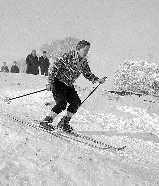 An enthusiastic skier weaves his way down Hampstead Heath, New Years Day 1962