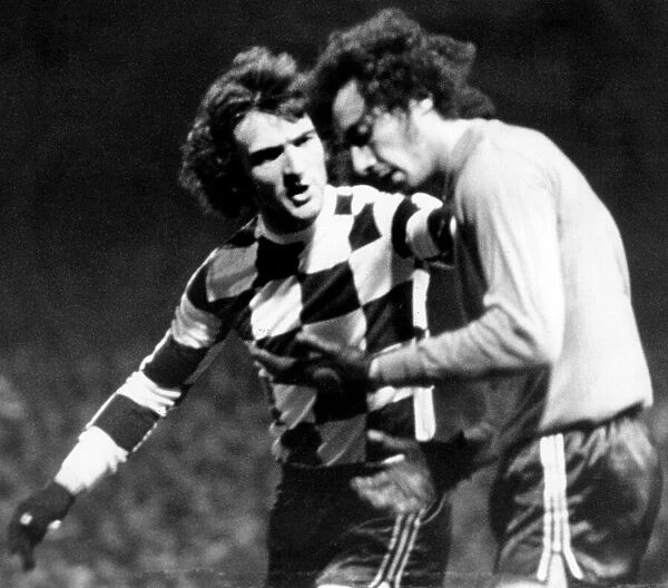 eqi Joao Botelho being consoled by team-mate November 1975