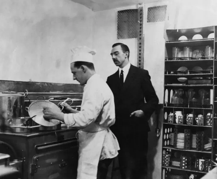 Framed Print : Eric Anderson Graham cook aboard the R101 seen here preparing a meal for the crew Framed Print : Eric Anderson Graham cook aboard the R101 seen here preparing a meal for the crew