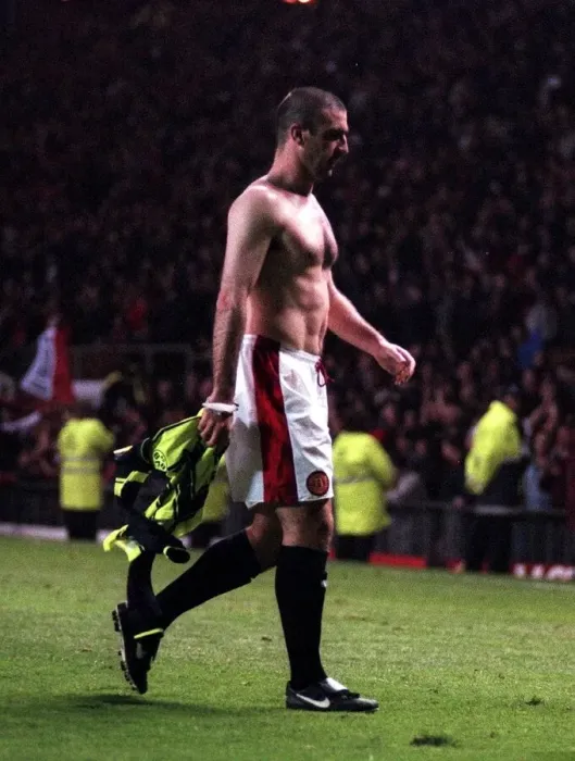 Framed Print : Eric Cantona Manchester United Football Player walks off the pitch topless dejected after Framed Print : Eric Cantona Manchester United Football Player walks off the pitch topless dejected after