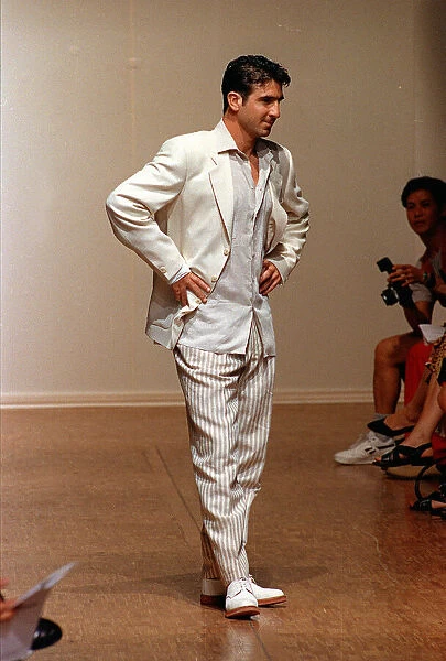 Eric Cantona models Paco Rabanne fashion on catwalk 1993 wearing grey silk shirt