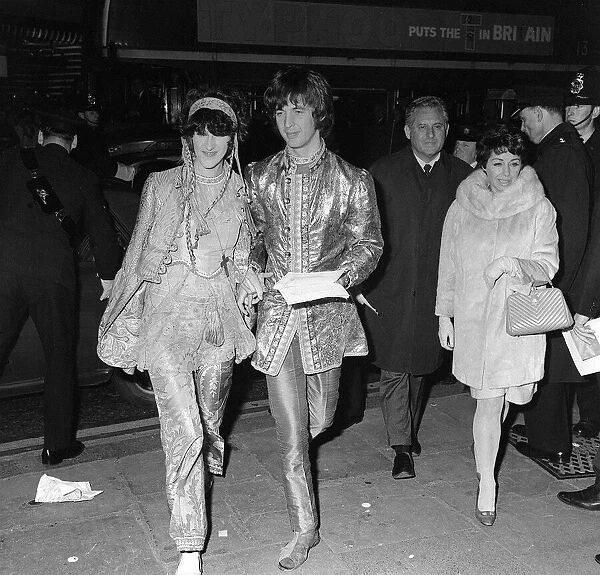 Eric Clapton of the progresive rock group Cream Oct 1967 arriving with guest at