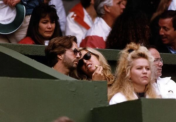 Eric Clapton Singer sitting in crowed