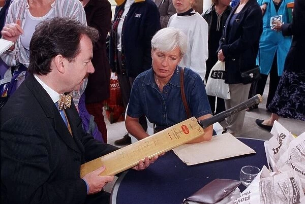 Eric Knowles Antiques Expert October 98 Looking at a cricket bat on The Antiques