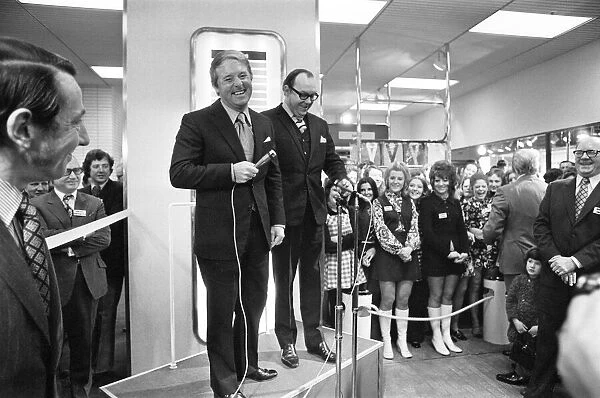 Eric Morecambe and Ernie Wise, accompanied by Miss Great Britain Carolyn Moore
