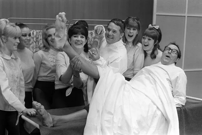 Framed Print : Eric Morecambe and Ernie Wise June 1965 clown it up with chorus girls in