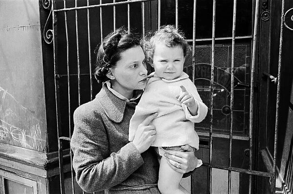 Eric Sailing, 1 year and 9 months, with his mother, 20 July 1944