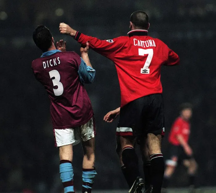 Framed Print : Erica Cantona of Manchester United pushes away West Hams Julian Dicks during the match Framed Print : Erica Cantona of Manchester United pushes away West Hams Julian Dicks during the match
