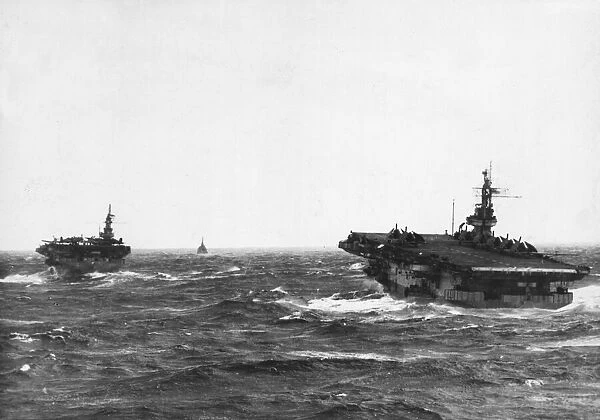 Two of the escort carriers, HMS Slinger (left) and HMS Speaker taking a tossing with