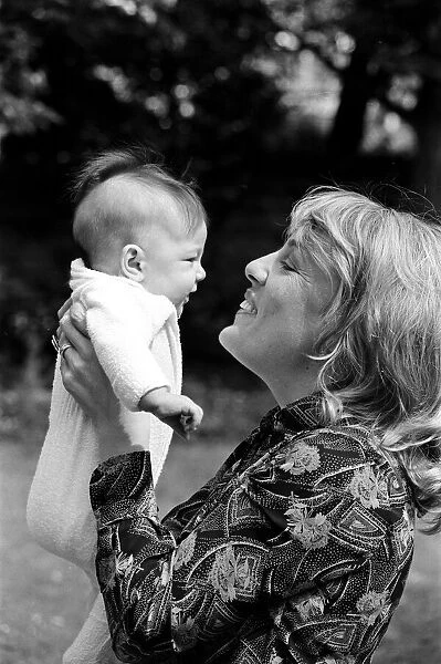 Esther Rantzen at home with her baby daughter Emily. 15th May 1978