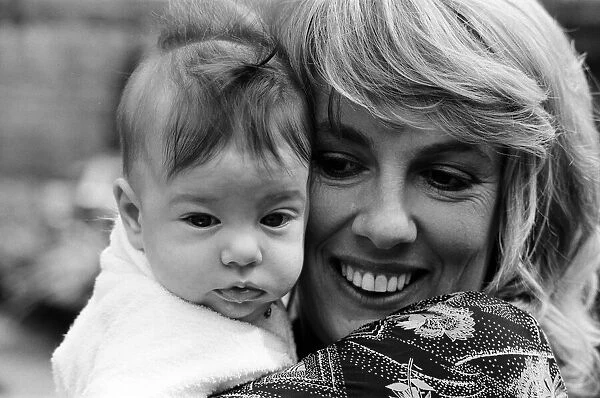 Esther Rantzen at home with her baby daughter Emily. 15th May 1978