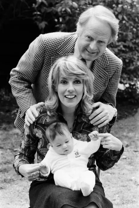 Framed Print : Esther Rantzen at home with her baby daughter Emily and husband Desmond Wilcox Framed Print : Esther Rantzen at home with her baby daughter Emily and husband Desmond Wilcox