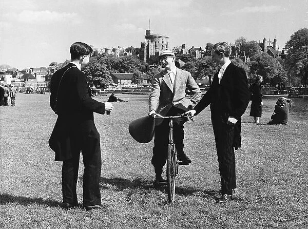 Eton scholars in uniform on the banks of the Thames Circa 1950