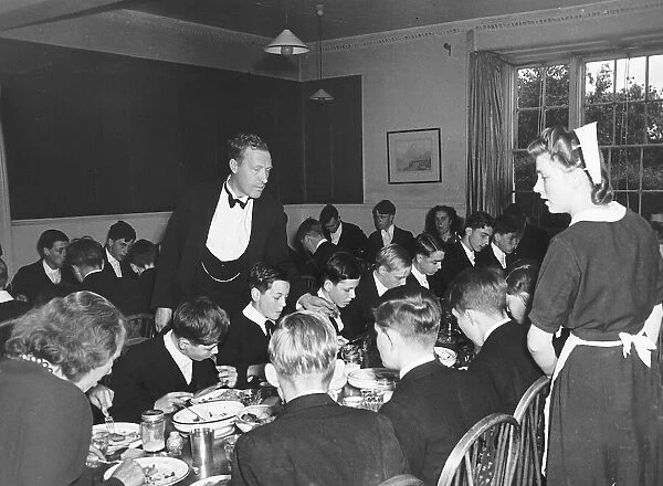 Eton School in Windsor Circa 1950s Pupils in the dinning hall eating dinner