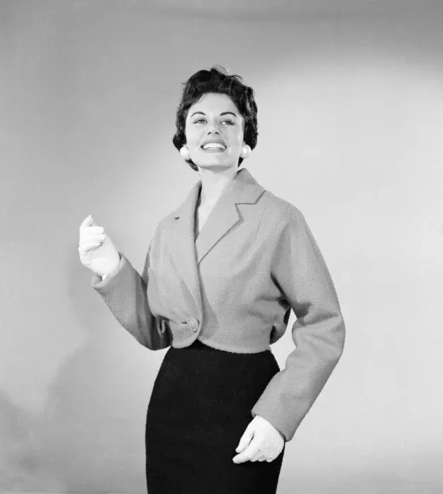 Framed Print : Eunice Gayson, actress and model, poses in a jacket for Sunday Mirror Promotion Framed Print : Eunice Gayson, actress and model, poses in a jacket for Sunday Mirror Promotion