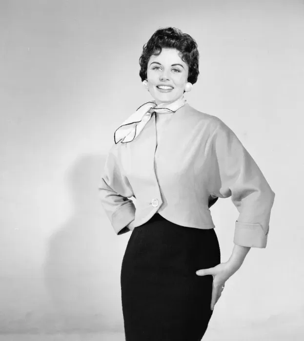 Framed Print : Eunice Gayson, actress and model, poses in a jacket for Sunday Mirror Promotion