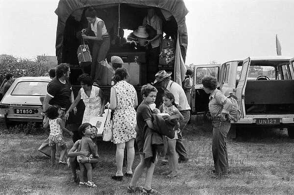 Evacuees unloading from a vehicle during the Turkish invasion of Cyprus. 22nd July 1974
