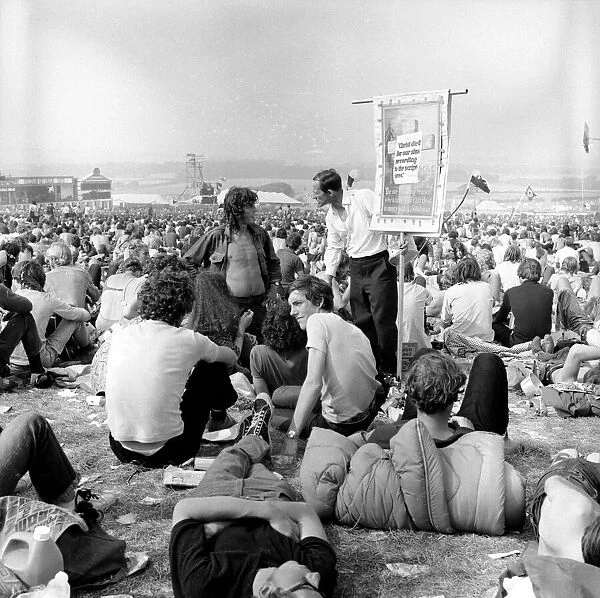 An Evangelist with music fans at The Isle of Wight Festival. 30th August 1970