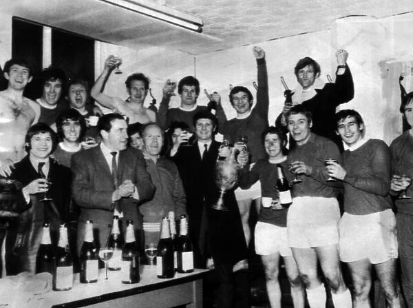 Everton celebrate in the Goodison Park dressing room after winning the League